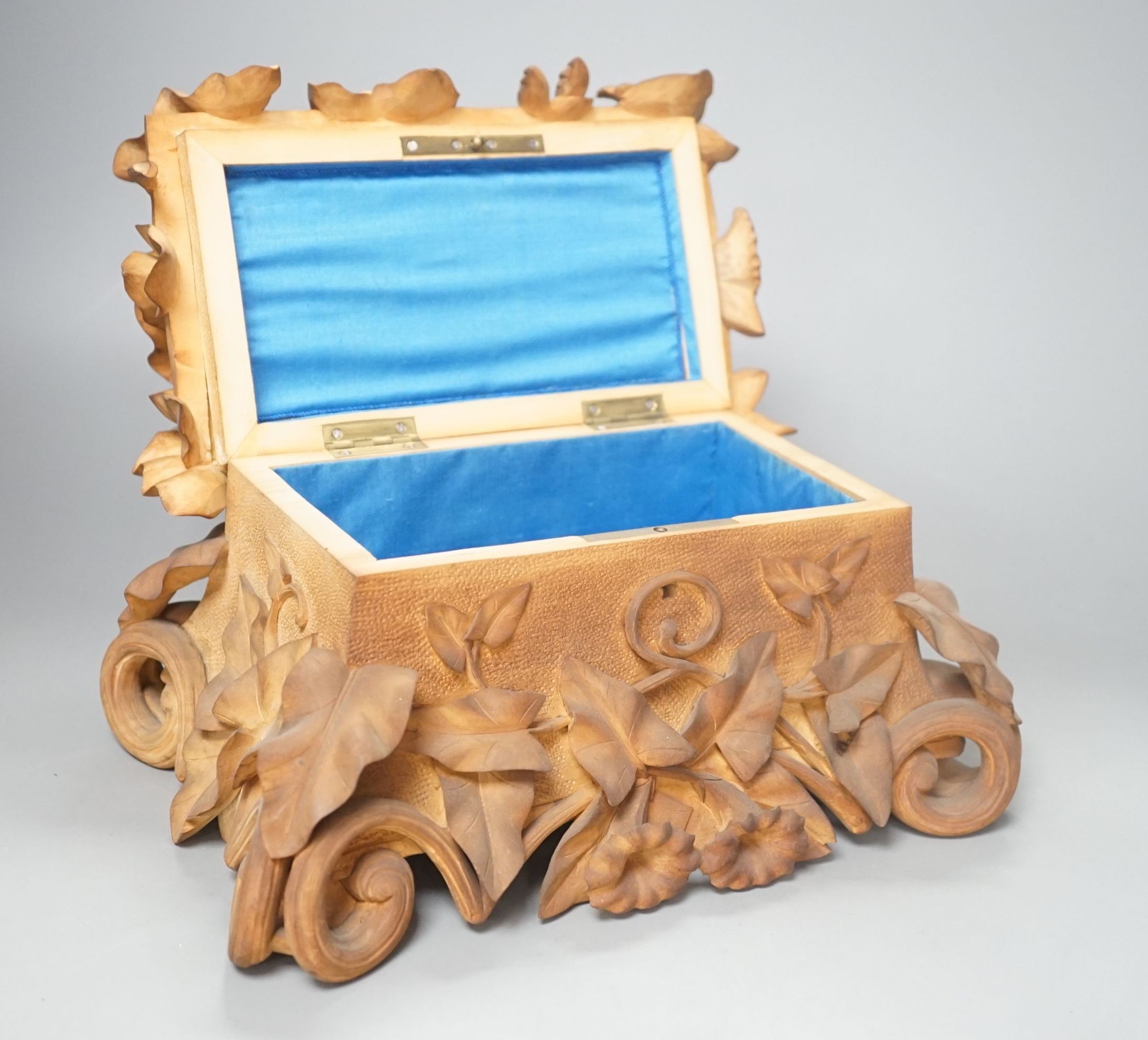 A 19th century Swiss ‘Convolvulus’ blonde wood casket, 27.5 cm wide x 21cms high.